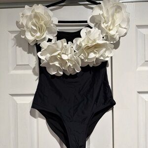 Elegant Black One-Piece Swimsuit with White Floral Accents